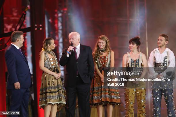 Viennese mayor Michael Ludwig, Missy May, former Viennese mayor Michael Haeupl, Zoe Straub, Verena Altenberger and Nathan Trent speak on stage during...