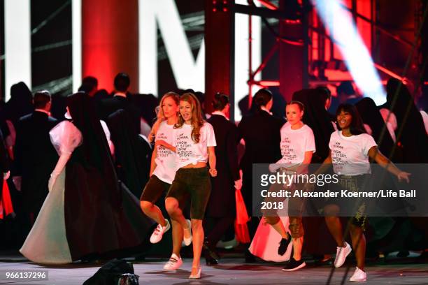 Vera Doppler, Zoe Straub, Missy May and Rose Alaba perform on stage during the Life Ball 2018 show at City Hall on June 2, 2018 in Vienna, Austria....