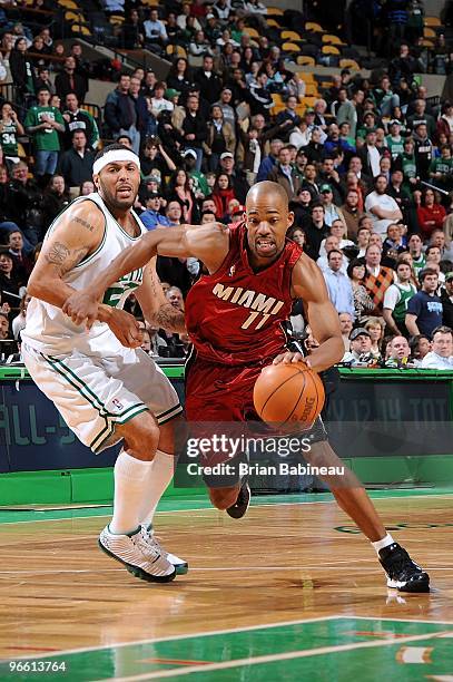 Rafer Alston of the Miami Heat drives the ball against Eddie House of the Boston Celtics during the game on February 3, 2010 at TD Banknorth Garden...