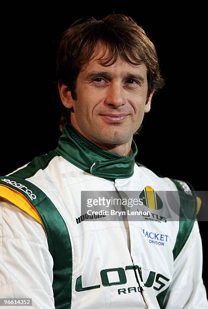 Lotus driver Jarno Trulli of Italy poses with the new Lotus T127 F1 car during the Lotus F1 launch at The Royal Horticultural Halls on February 12,...