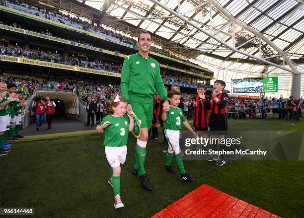 Dublin , Ireland - 2 June 2018; John O'Shea of Republic of Ireland makes his way onto the pitch with his daughter Ruby and son Alfie prior to the...