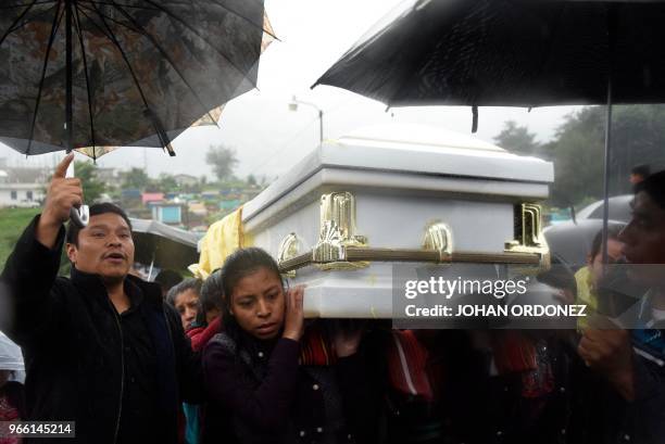 Indigenous people carry the coffin of Claudia Gomez, a 19-year-old Guatemalan woman who was allegedly shot and killed by a U.S. Border patrol agent,...