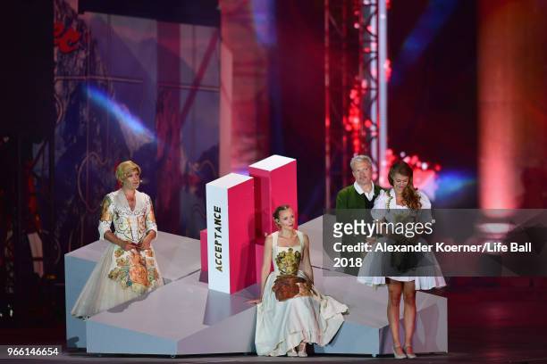 Conchita Wurst, Missy May, Herbert Foettinger and Zoe Straub perform on stage during the Life Ball 2018 show at City Hall on June 2, 2018 in Vienna,...