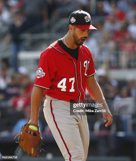 Pitcher Gio Gonzalez of the Washington Nationals reacts after the fifth inning, during which he gave up a 3-run home run, during the game against the...