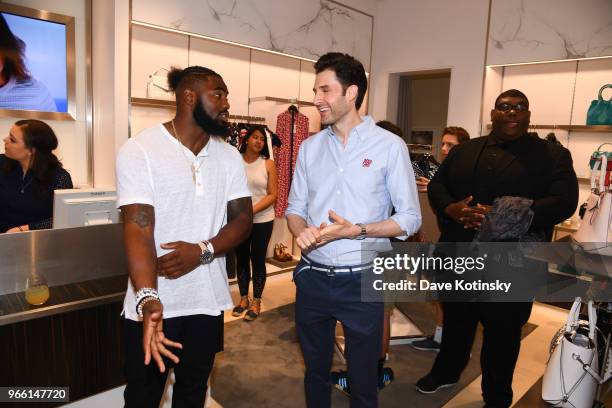 Guests and Landon Collins poses at the Michael Kors & GQ Summer Kickoff With Landon Collins on June 2, 2018 in Short Hills City.