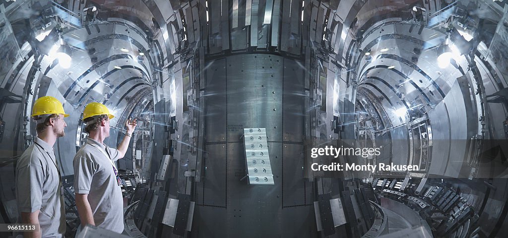 Scientists Working In A Fusion Reactor
