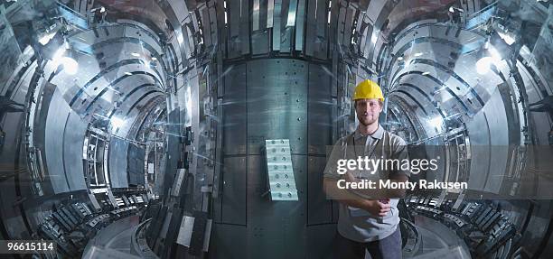 scientist inside a fusion reactor - nuclear fusion stock-fotos und bilder