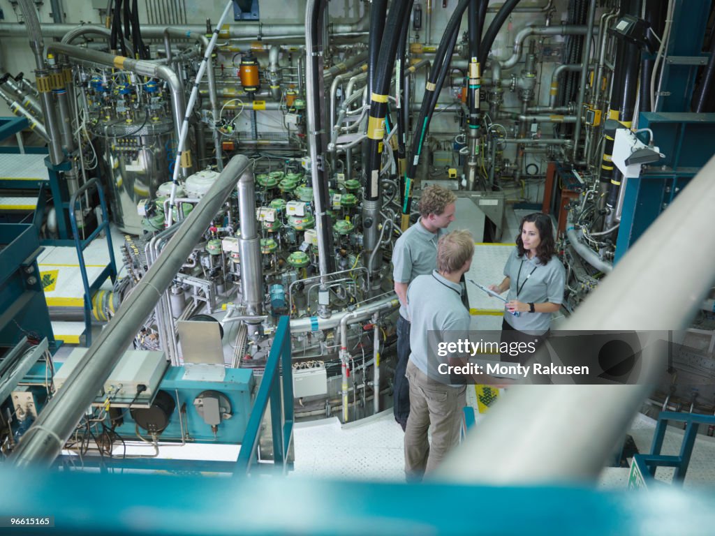 Fusion Reactor Scientists At Work