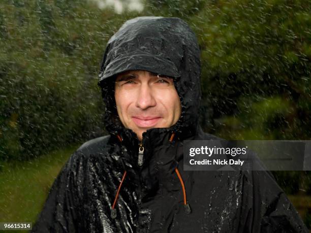 a man getting soaked in the rain - inconvenience stock pictures, royalty-free photos & images