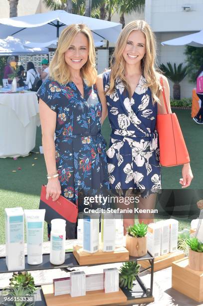 Nikki DeLoach and Ellie Knaus attend Neocell Presents Bloom Summit at The Beverly Hilton Hotel on June 2, 2018 in Beverly Hills, California.