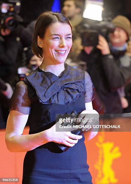 British actress Olivia Williams arrives on the red carpet ahead of the premiere of the movie "The Ghost Writer" by Roman Polanski, during the 60th...