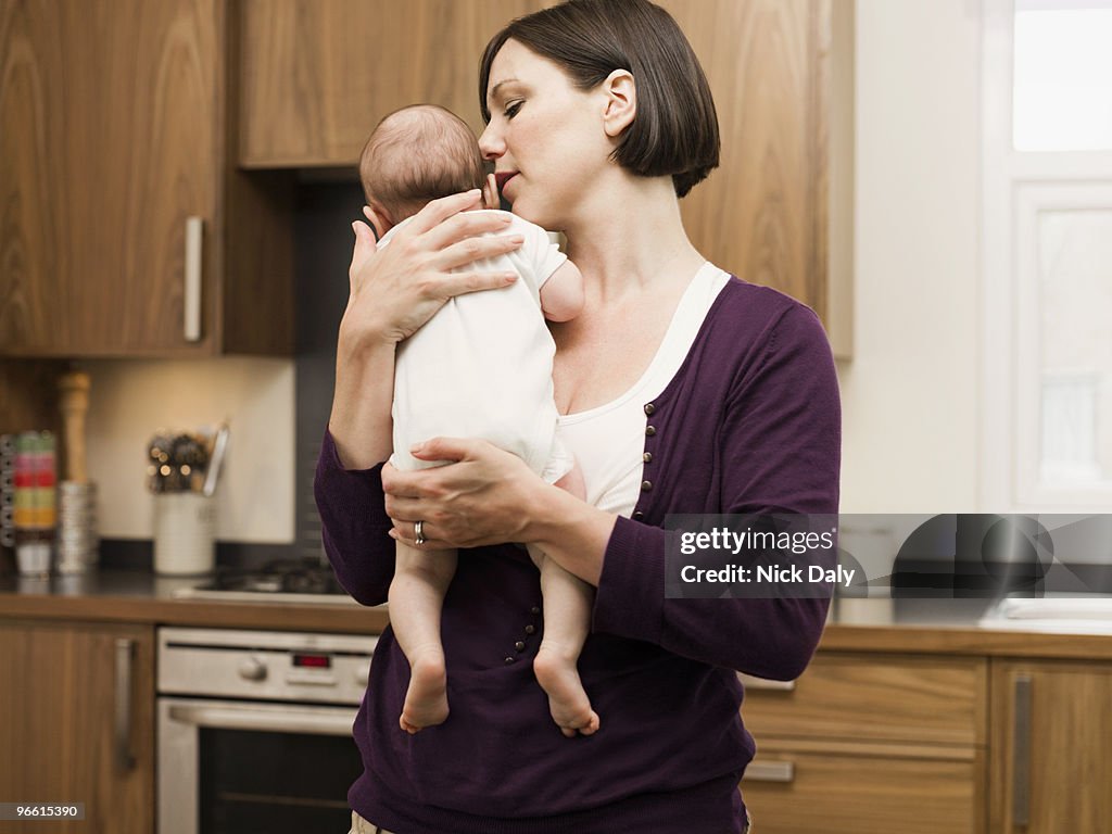 Mother holding her baby