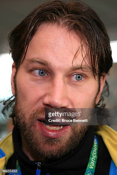 Hockey player Peter Forsberg of Sweden answers questions as he is stopped by reporters at the Main Press Centre during the Vancouver 2010 Winter...