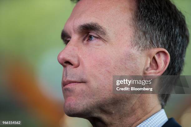 Bill Morneau, Canada's minister of finance, listens during a news conference at the closing of the G7 finance ministers and central bank governors...