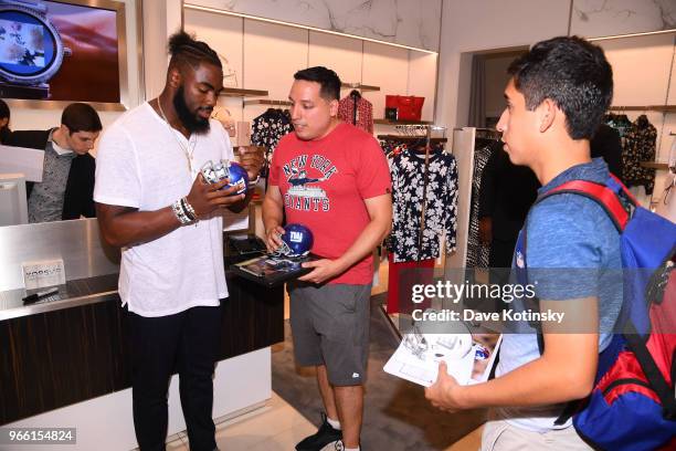 Guests and Landon Collins poses at the Michael Kors & GQ Summer Kickoff With Landon Collins on June 2, 2018 in Short Hills City.