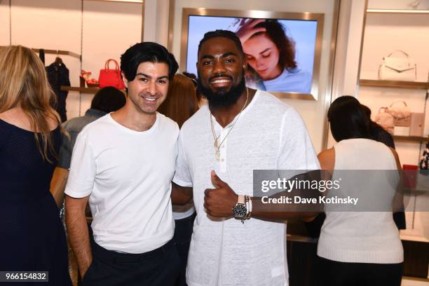 Guests and Landon Collins poses at the Michael Kors & GQ Summer Kickoff With Landon Collins on June 2, 2018 in Short Hills City.