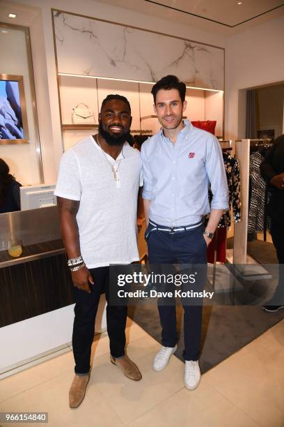 Guests and Landon Collins poses at the Michael Kors & GQ Summer Kickoff With Landon Collins on June 2, 2018 in Short Hills City.