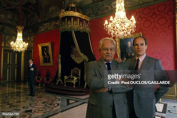 Prince Rainier and his son Prince Albert in the throne room.