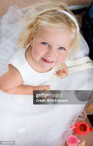 young girl in white dress portrait - britt erlanson stock pictures, royalty-free photos & images