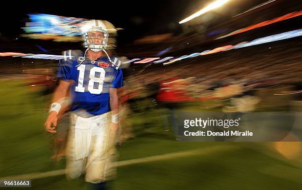 Peyton Manning of the Indianapolis Colts leaves the field after his team was defeated by the New Orleans Saints in Super Bowl XLIV on February 7,...