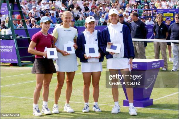 Eastbourne, uk, june 23, 2001 britannic asset management tennis champions women's doubles runners up cara black, zimbabwe and elena likhovtseva,...