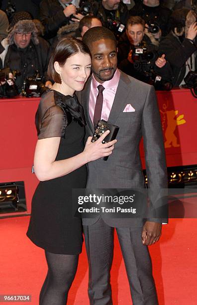 Actress Olivia Williams and Rhashan Stone attend 'The Ghost Writer' Premiere during day two of the 60th Berlin International Film Festival at the...