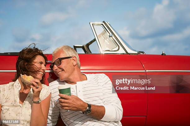 couple with car, coffee break - snack break stock pictures, royalty-free photos & images