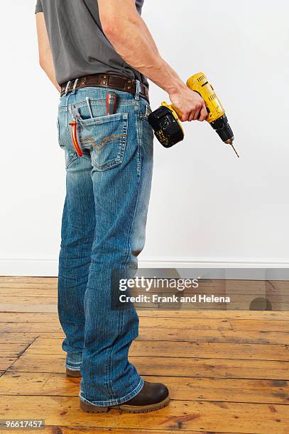 man doing diy - holding tool stock pictures, royalty-free photos & images