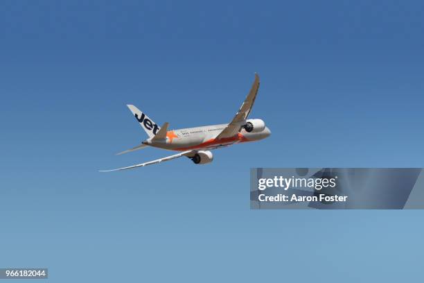 jet star dreamliner 787 aircraft in flight - aircraft planes aaron foster stock pictures, royalty-free photos & images