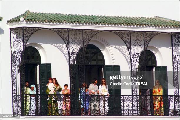 Young prince Moulay Al Hassan takes queen Salma to the Balcony of the Tetuan royal palace while his Highness Mohammed VI delivers his speech.