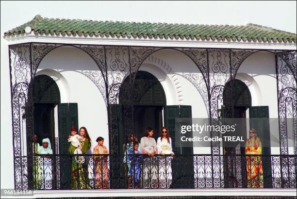 Young prince Moulay Al Hassan takes queen Salma to the Balcony of the Tetuan royal palace while his Highness Mohammed VI delivers his speech.