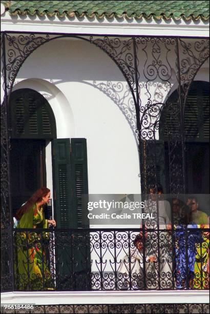 Young prince Moulay Al Hassan takes queen Salma to the Balcony of the Tetuan royal palace while his Highness Mohammed VI delivers his speech.