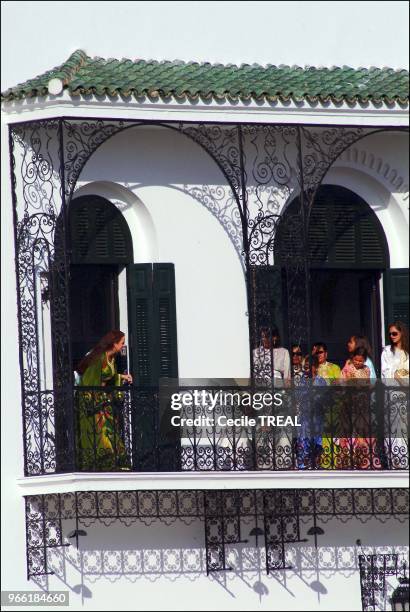 Young prince Moulay Al Hassan takes queen Salma to the Balcony of the Tetuan royal palace while his Highness Mohammed VI delivers his speech.