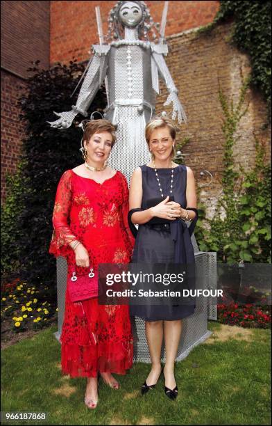 Princess Astrid of Belgium with Princess Diana of Wurttemberg with her art pieces at the Bade- Wuttemberg Ambassy in Brussels.