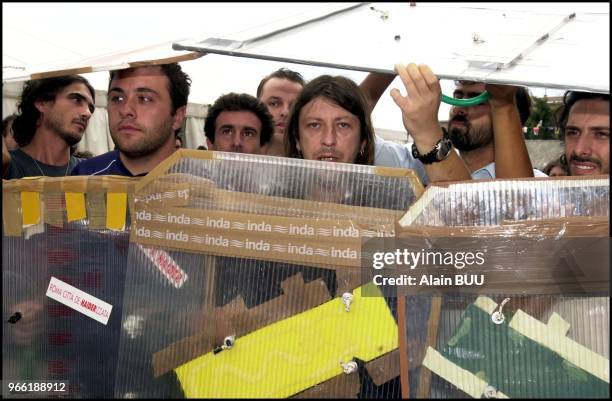 Luca Casarini making an exhibition to fight against the anti riot police forces during a march against the G8 summit.