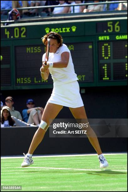Wimbledon, uk june 26, 2001 Lindsay Davenport blasts her way to straight-set 1st round victory over Slovakia's Martina Sucha.