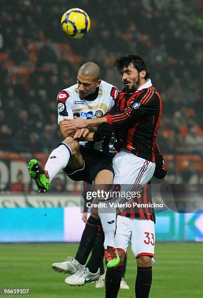 Gennaro Gattuso of AC Milan clashes with Gokhan Inler of Udinese Calcio during the Serie A match between AC Milan and Udinese Calcio at Stadio...