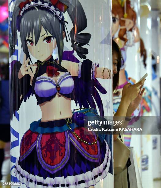 The animation characters of the smartphone game fill up the wall of the Shinjuku Station underpass in commemoration of the release first anniversary,...