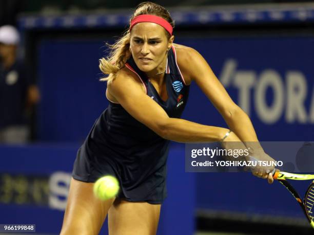 Rio de Janeiro Olympics gold medalist Monica Puig of Puerto Rico returns the ball against Varvara Lepchenko of the United States during the first...