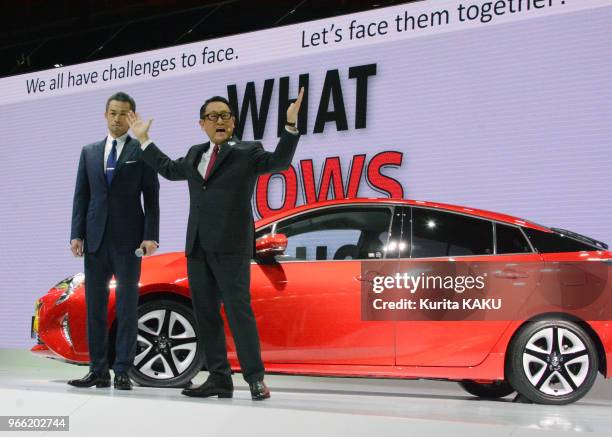 Akio Toyoda, president of Toyota Motor Co., Ltd, makes a presentation in front of new " PRIUS " with guest star Ichiro, Japanese Major Leagues...