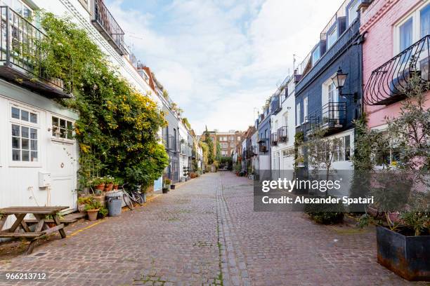 mews houses along cobbled street in notting hill, london, england, uk - england street stock pictures, royalty-free photos & images