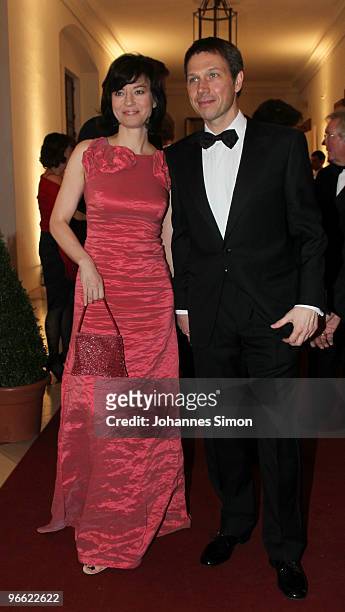 Rene Obermann and Maybrit Illner arrive for the Hubert Burda Birthday Reception at Munich royal palace on February 12, 2010 in Munich, Germany.