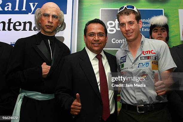 Juan Manuel Oliva, Governor of Guanajuato State, and Mexican pilot Benito Guerra pose during the press conference of the Rally Mexico Bicentenary...