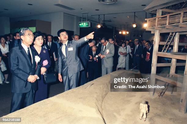 Prince Mikasa and Princess Yuriko of Mikasa visit a Yoshinogari site exhibition at the Ancient Orient Museum on September 9, 1989 in Tokyo, Japan.