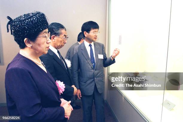 Prince Mikasa and Princess Yuriko of Mikasa visit a Yoshinogari site exhibition at the Ancient Orient Museum on September 9, 1989 in Tokyo, Japan.