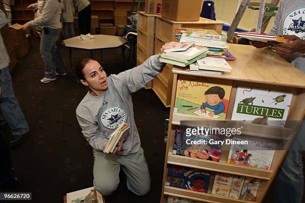 Becky Hammon of the San Antonio Silver Stars during the 2010 NBA All-Star Day of Service at the North Texas Volunteer Center - "Learn" Dallas on...