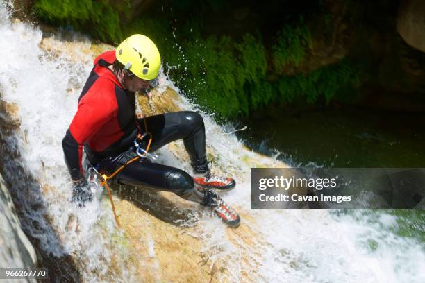 high angle view of hiker canyoneering at aragon - canyoning stock pictures, royalty-free photos & images