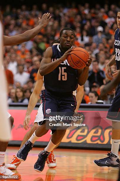 Kemba Walker of the Connecticut Huskies drives to the basket during the game against the Syracuse Orange at Carrier Dome on February 10, 2010 in...