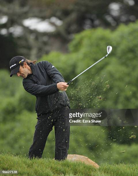 Musician Kenny G tees off on the 11th hole during round two of the AT&T Pebble Beach National Pro-Am at the Monterey Peninsula Country Club Shore...