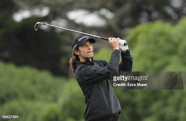 Musician Kenny G tees off on the 11th hole during round two of the AT&T Pebble Beach National Pro-Am at the Monterey Peninsula Country Club Shore...